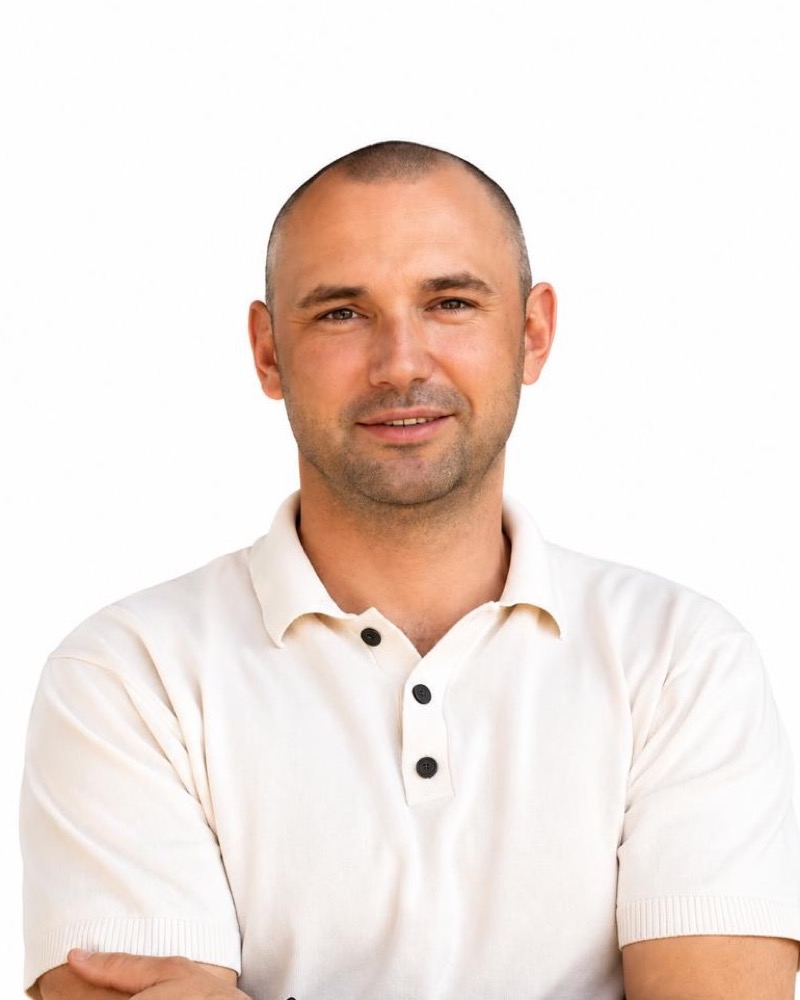 Portrait of Pavlo Derkach, Founder & Operations Lead